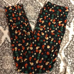 Black LuLaRoe leggings with birds and flowers